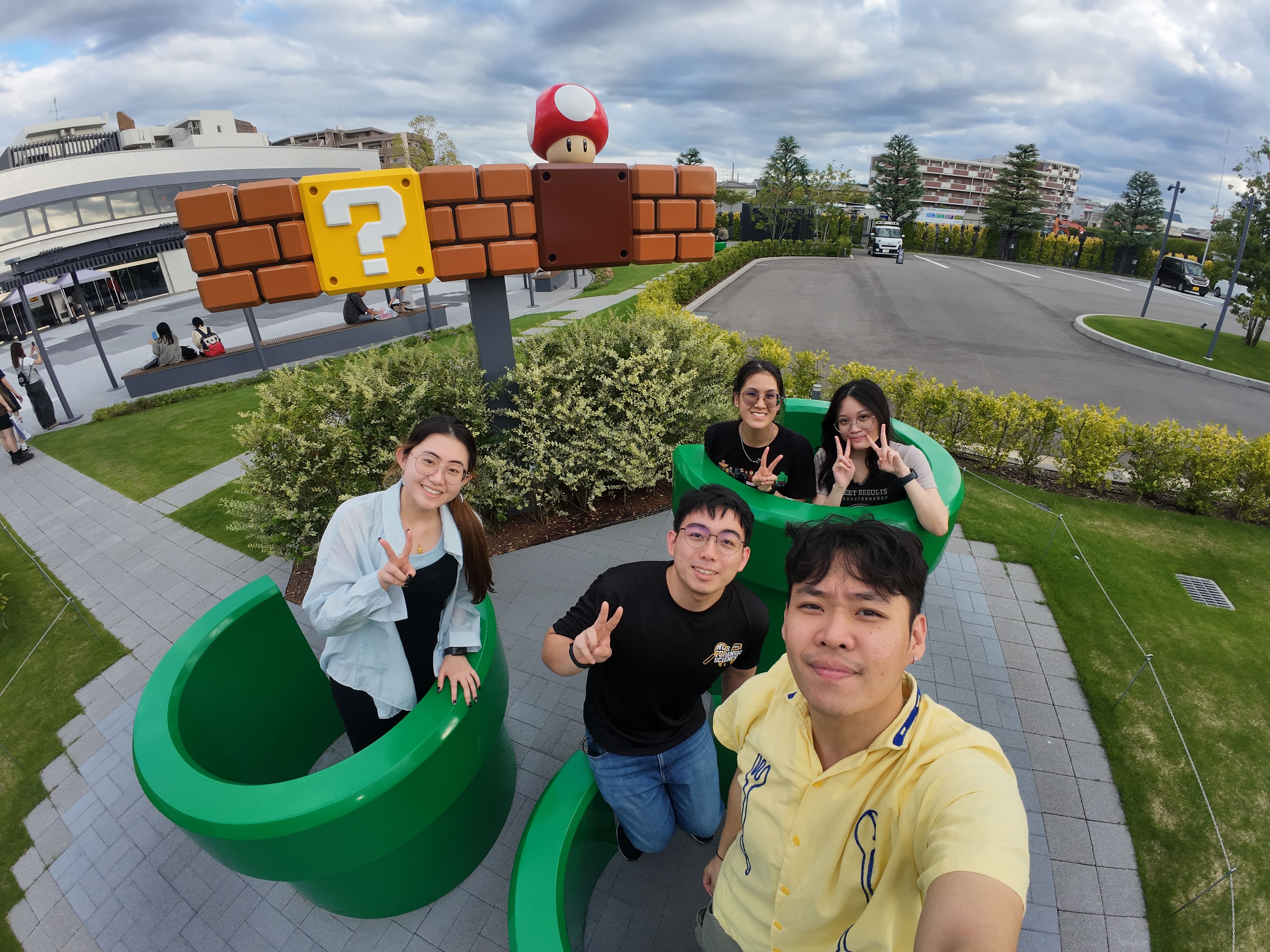 Us in a mario pipes sculpture