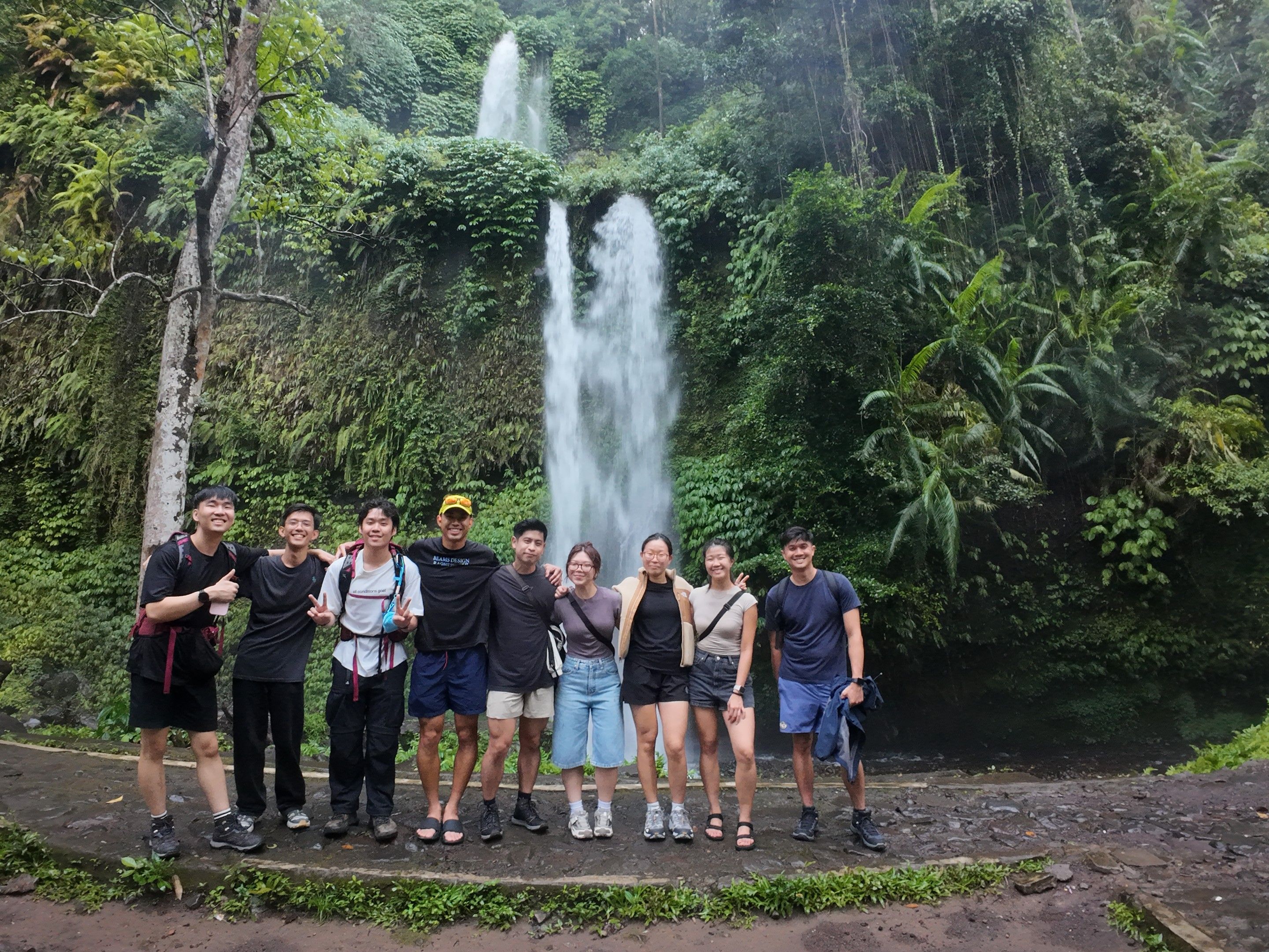 Group in front of a waterfall