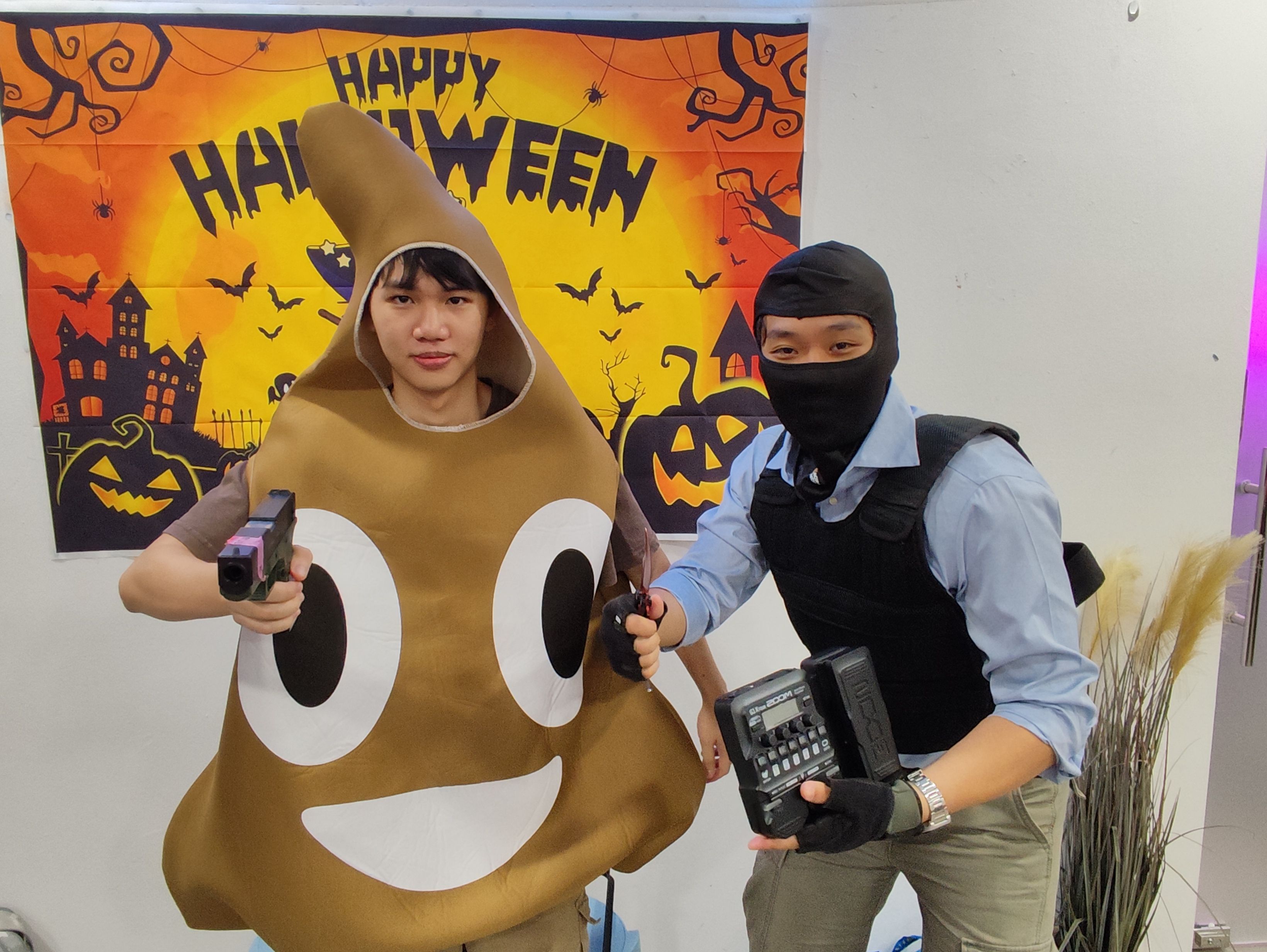 My friend in a poop emoji costume, and me
