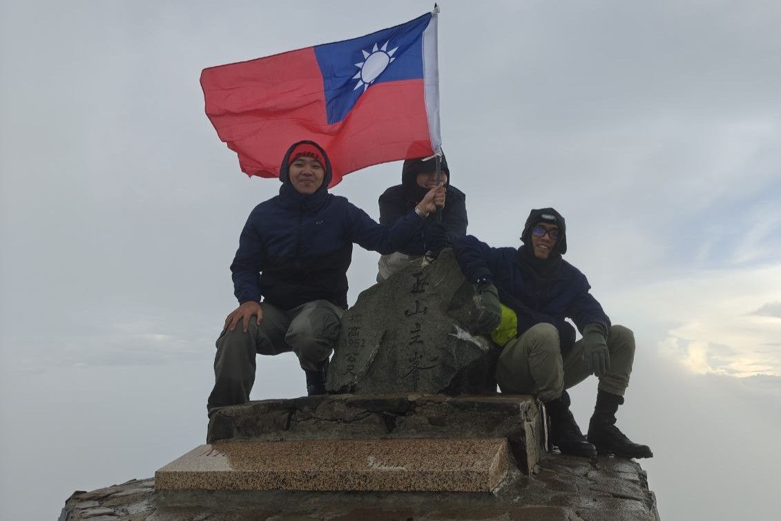 Three of us at the summit of Jade Mountain.