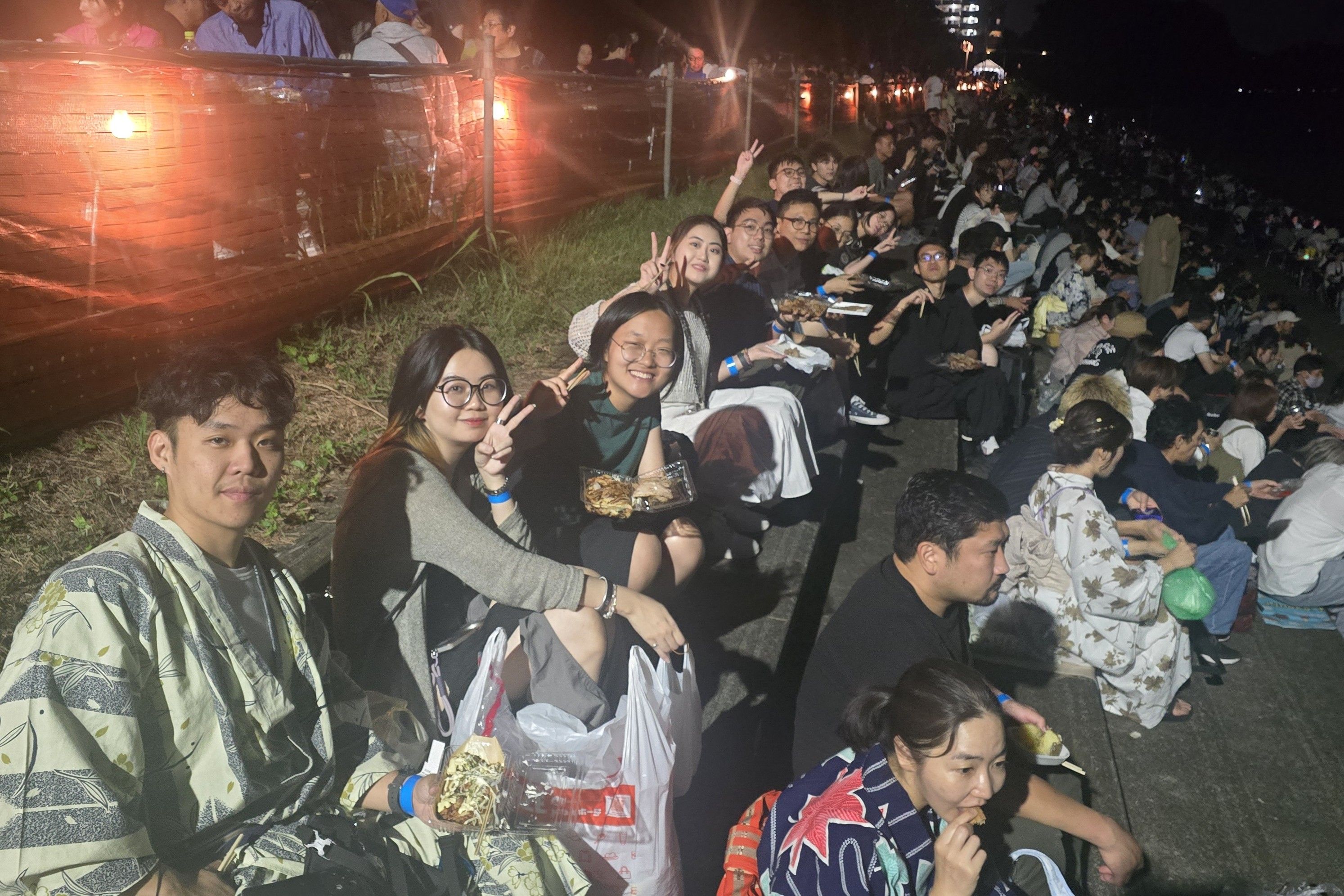 Us gathered at a grandstand