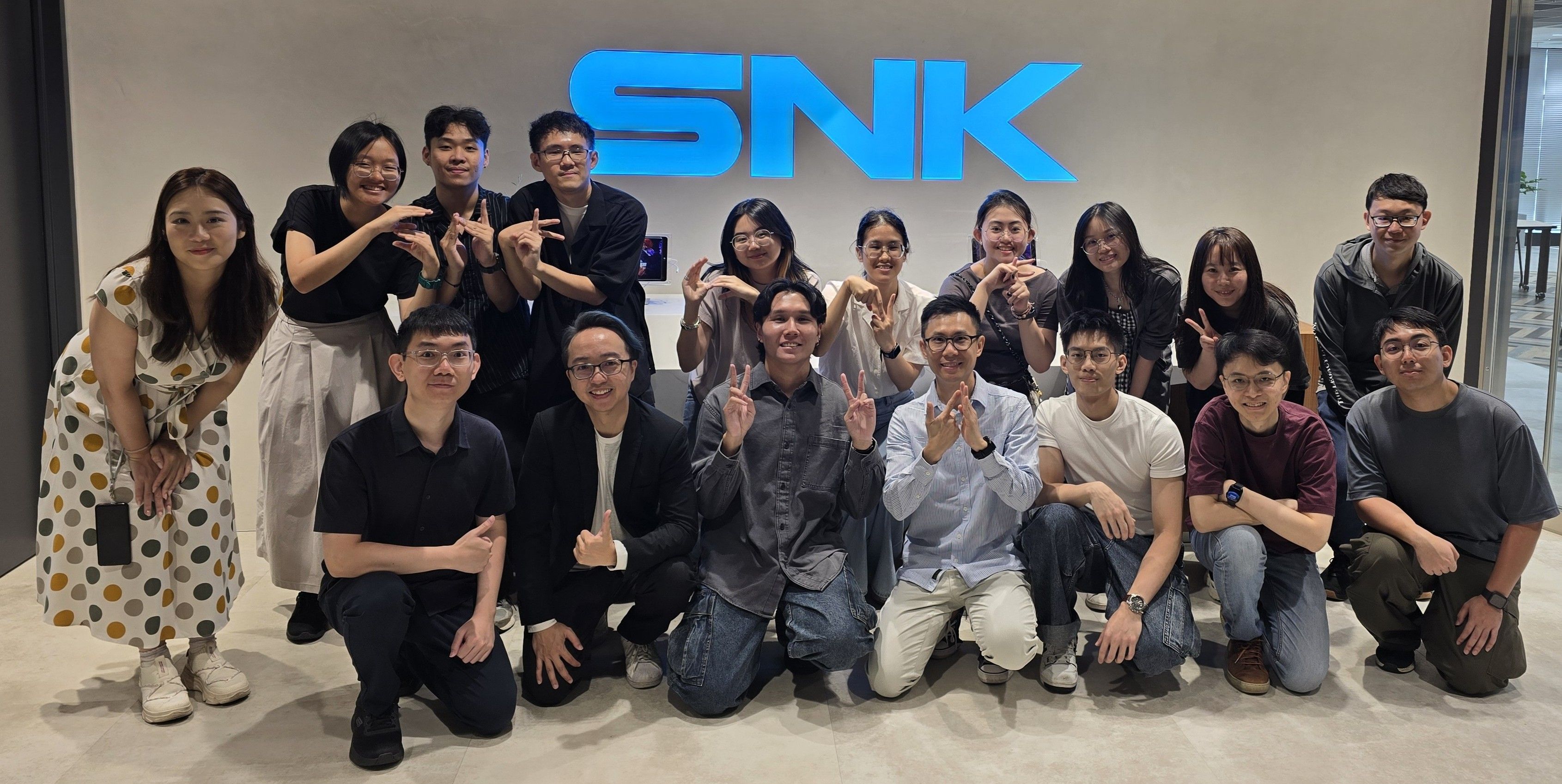 Group photo at SNK office