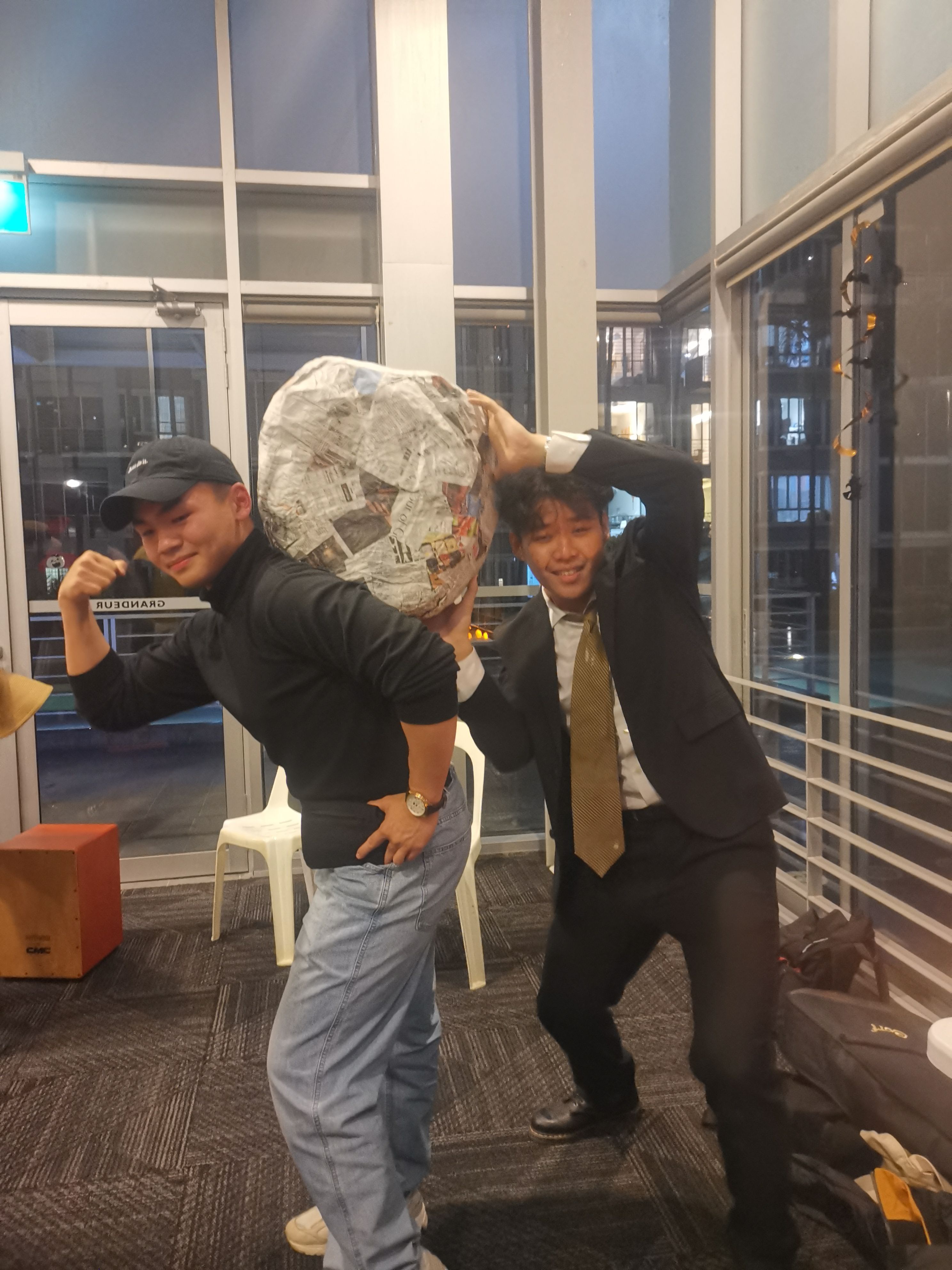 Me pushing my rock up another guy dressed as The Rock.